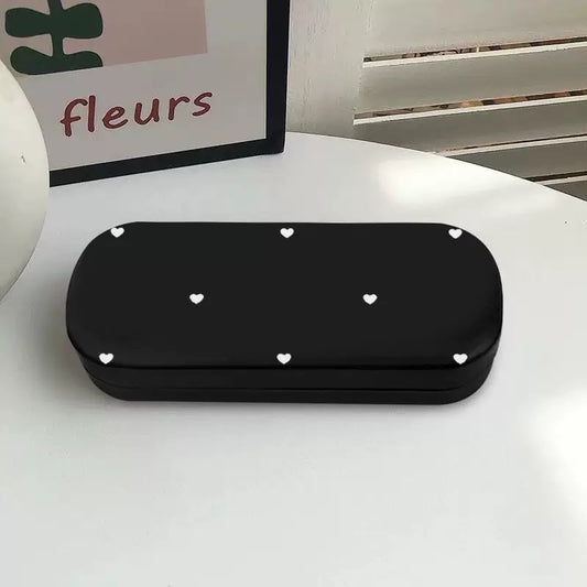 Aesthetic black glasses case with a heart design, perfect for keeping your eyewear safe.